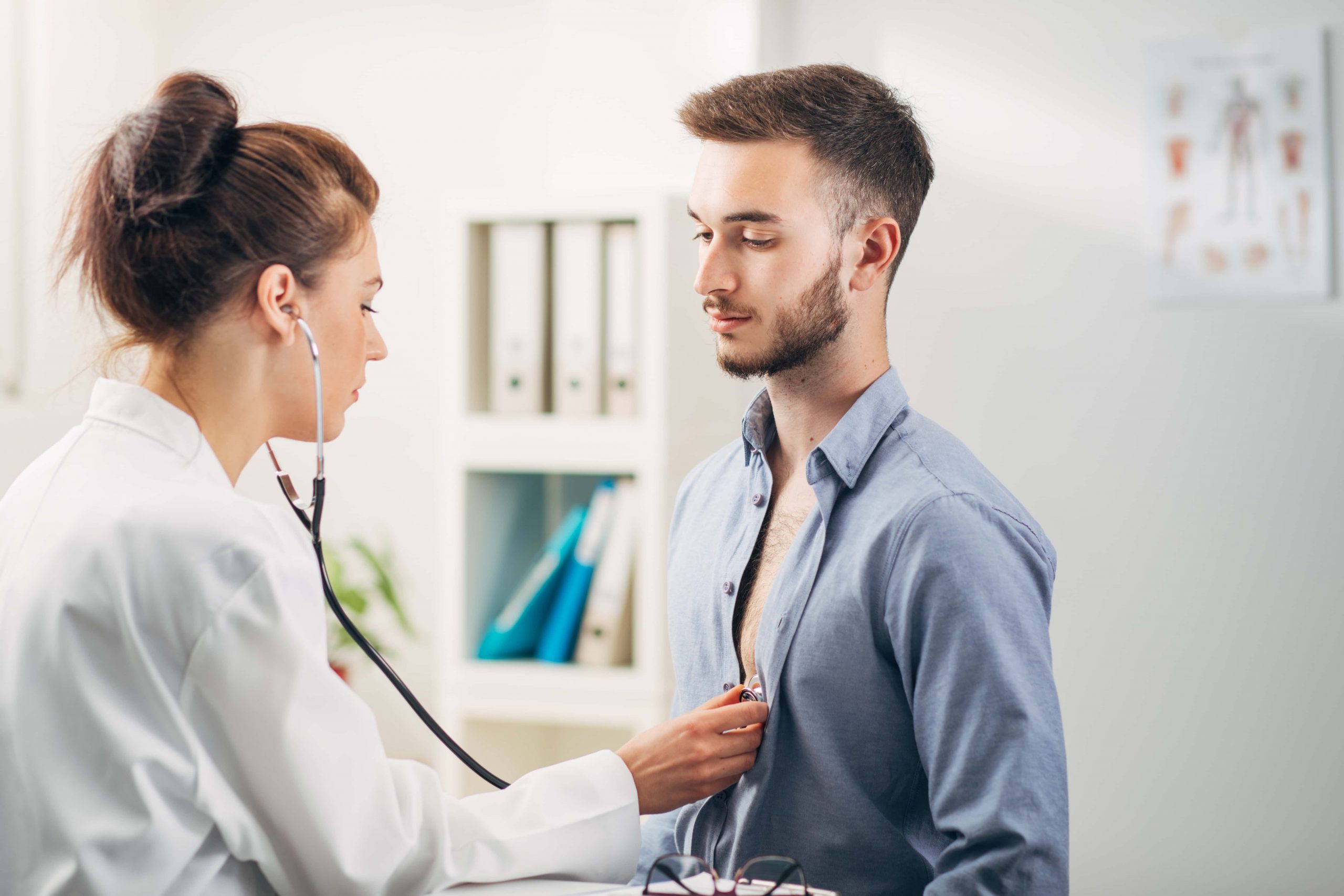 A leady doctor doing Health Screening of an employee